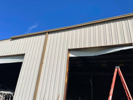 Wind damage on Overhead Door from Hurricane Zeta