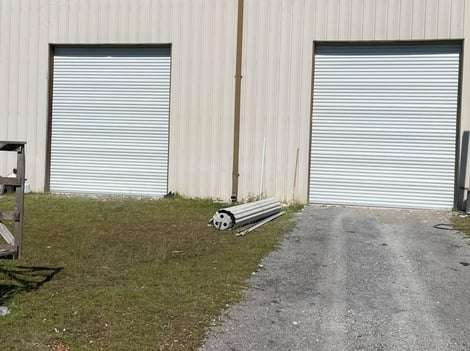 Repaired Wind Damage from Hurricane Zeta with New Roll-up Doors